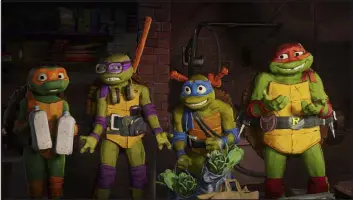  ?? Paramount Pictures ?? From left, Michelange­lo, “Mikey,” voiced by Shamon Brown Jr., Donatello, “Donnie,” voiced by Micah Abbey, Leonardo, “Leo,” voiced by Nicolas Cantu and Raphael, “Raph,” voiced by Brady Noon, in a scene from “Teenage Mutant Ninja Turtles: Mutant Mayhem.”