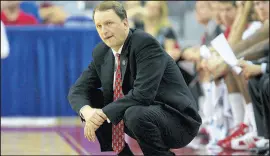  ?? STREETER LECKA/GETTY 2008 ?? Dakich watches the play develop during a game against Arkansas in the first round of the NCAA Tournament.