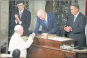  ?? PABLO MARTINEZ MONSIVAIS — THE ASSOCIATED PRESS FILE ?? Then-Vice President Joe Biden shakes hands with Pope Francis on Capitol Hill in Washington. Then-House Speaker John Boehner of Ohio is at right.