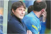  ?? Reuters-Yonhap ?? Tottenham Hotspur manager Antonio Conte watches his players before the Premier League match against Norwich City at Carrow Road, Norwich, Sunday.