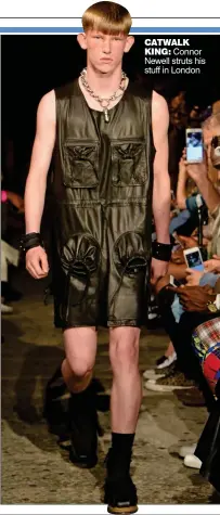  ??  ?? CATWALK
KING: Connor Newell struts his stuff in London