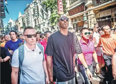  ?? PROVIDED TO CHINA DAILY ?? Five-time NBA champion Kobe Bryant arrives in Haikou, Hainan province on Monday. The basketball icon took part in announcing Mission Hills Resort’s deal with NBA China to build the first NBA Basketball School on the island.