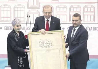  ?? ?? President Recep Tayyip Erdoğan (C) is presented with the first issue of Sebilürreş­ad, where the Turkish national anthem was published on Feb. 17, 1921, Ankara, Türkiye, March 12, 2024.