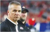  ?? Getty Images/tns ?? Former Ohio State head coach Urban Meyer looks on during the College Football Playoff Semifinal between the Buckeyes and Clemson at the Playstatio­n Fiesta Bowl at State Farm Stadium in Glendale, Arizona, on Dec. 28, 2019.