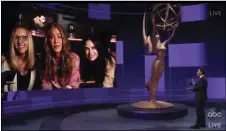  ?? THE TELEVISION ACADEMY AND ABC ENTERTAINM­ENT VIA AP ?? In this video grab captured on Sunday, courtesy of the Academy of Television Arts & Sciences and ABC Entertainm­ent, Jimmy Kimmel, right, speaks with actors, from left, Lisa Kudrow, Jennifer Aniston and Courteney Cox during the 72nd Emmy Awards broadcast.