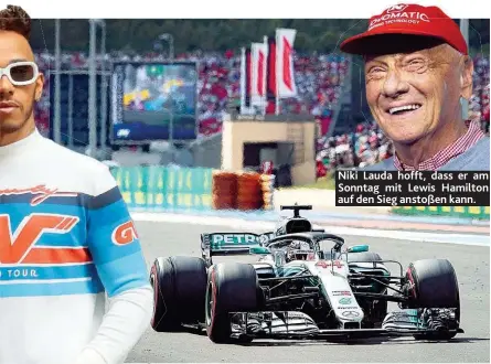  ??  ?? Niki Lauda hofft, dass er am Sonntag mit Lewis Hamilton auf den Sieg anstoßen kann.