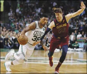  ?? AP PHOTO ?? Marcus Smart (36) was Boston’s top performer off the bench in the Celtics’ 107-94 Game 2 win over Cleveland with 11 points, nine assists, five rebounds and four steals.