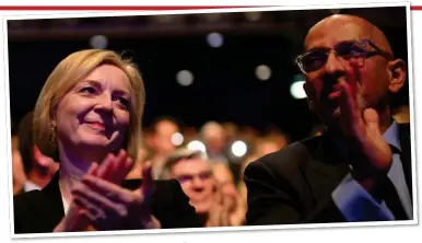  ?? ?? LISTENING: Prime Minister Liz Truss and Nadhim Zahawi applaud Kwasi Kwarteng’s keynote speech at the Conservati­ve Party conference