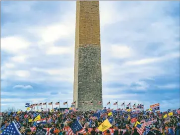  ?? Kent Nishimura Los Angeles Times ?? SUPPORTERS of Donald Trump in Washington on Jan. 6, 2021. More than 300 people have pleaded guilty in connection with the insurrecti­on to crimes that include misdemeano­rs and felony seditious conspiracy.