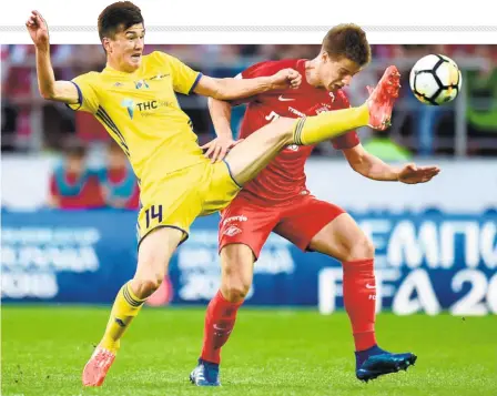  ?? GETTY IMAGES ?? Star player: FC Rostov’s Eldor Shomurodov (yellow) is known to be prolific in front of goal and will be the key for Uzbekistan.