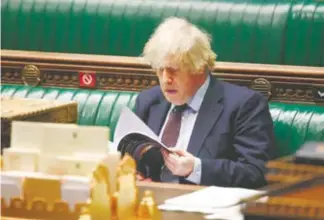  ?? AFP ?? El primer ministro Boris Johnson presentó su estrategia al Parlamento/