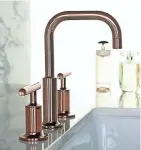  ?? KOHLER PHOTOS ?? While you probably wouldn't want an entire house full of rose gold finishes, a touch here and there blends well with the wide range of other metals available for the kitchen and bathroom.