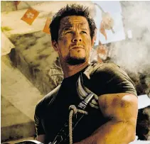  ??  ?? Mark Wahlberg plays Carl Yaeger, an ever-so-watchable action hero, in the fourth movie in the Transforme­rs franchise.