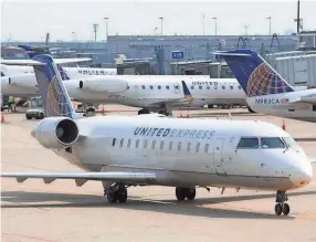  ?? JEREMY DWYER-LINDGREN/SPECIAL TO USA TODAY ?? Regional jets including the Bombardier CRJs used by United Express usually carry less than 100 passengers so getting the weight calculatio­ns correct is key.