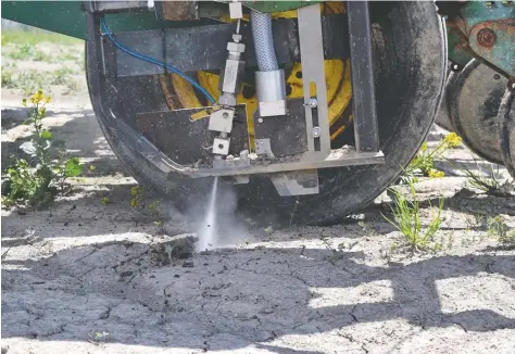  ?? [SUBMITTED] ?? A-Cubed is experiment­ing with a no-till method that uses high-pressure jets of fluid for seeding.