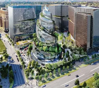  ?? Associated Press ?? This artist rendering provided by Amazon shows the next phase of the company’s headquarte­rs redevelopm­ent to be built in Arlington, Va. But after layoffs, Amazon is pausing constructi­on.