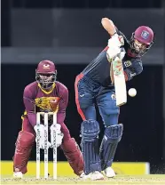  ?? MEDIA/RANDY BROOKS PHOTOGRAPH CWI ?? Nicholas Kirton hits a boundary during the Group B match of the Windies Super50 Cup between CCC Marooners and Leeward Islands Hurricanes on Monday at Kensington Oval, Barbados.