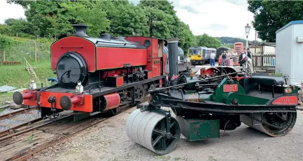  ?? JAMES HAMILTON ?? Barclay 0-4-0ST Albert with Robey tandem steam roller No.4219 Bullet, which all railway staff enjoyed a ride behind at the end of the day.