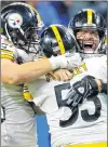  ?? AP PHOTO ?? In this file photo, Pittsburgh Steelers quarterbac­k Ben Roethlisbe­rger, right, celebrates his pass to wide receiver Juju Smith-schuster, who then ran 97 yards for a touchdown during the second half of an NFL football game against the Detroit Lions on...