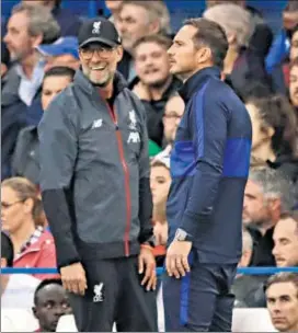  ??  ?? Liverpool manager Jurgen Klopp (left) and Chelsea boss Frank Lampard during Sunday’s game.
AP