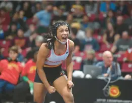  ?? ?? Crofton’s Lexy Pabon celebrates her win over Perry Hall’s Rachael Wheatley in the 125-pound final of the girls state tournament.