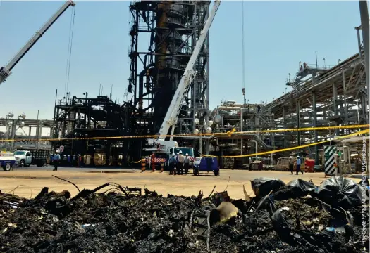  ??  ?? A destroyed installati­on in Saudi Arabia's Khurais oil processing plant is pictured on September 20. The attack was claimed by Yemen's Houthi movement, but Saudi Arabia and the United States have increasing­ly blamed Iran.