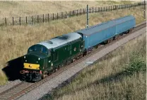  ?? Brad Joyce ?? Locomotive Services Group’s D6817 (37521) hauls barrier coaches 6352 and 6353 through Stone Road, working 5Z21 from Worksop to Crewe on August 4.