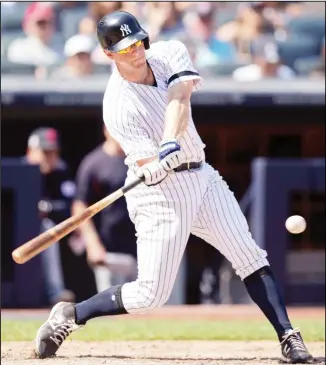  ??  ?? New York Yankees’ D.J. LeMahieu hits a home run during the fifth inning of a baseball game against the Cleveland
Indians on Aug 17 in New York. (AP)