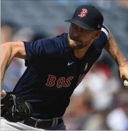  ?? REED HOFFMANN — THE ASSOCIATED PRESS ?? Red Sox pitcher Chris Sale threw five scoreless innings in Sunday’s win over the Kansas City Royals.
