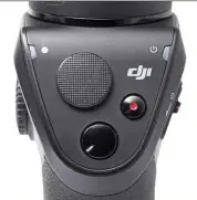  ??  ?? The lit tle joystick controls the gimbal head, the red button starts and stops video recording, and the black button shoots still images.