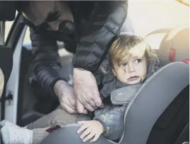  ??  ?? ↑ Some child car seats purchased by investigat­ors did not have safety labels