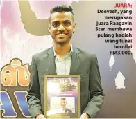  ??  ?? JUARA: Deevesh, yang merupakan juara Raagavin Star, membawa pulang hadiah wang tunai bernilai RM3,000.
