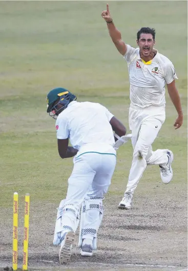  ?? Picture: GETTY IMAGES ?? HE’S OUT: Mitchell Starc of Australia celebrates the wicket of Kagiso Rabada of the Proteas during day four of the first Sunfoil Test.