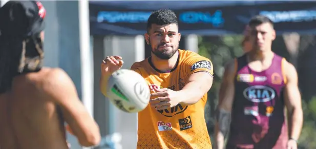  ?? Picture: AAP IMAGE/Darren England ?? WANTED MAN: David Fifita (centre) is seen during Brisbane Broncos training at Clive Berghofer Field in Brisbane.