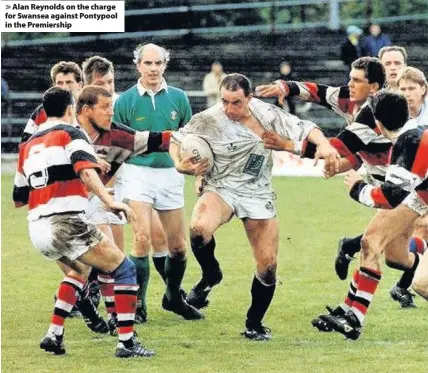  ??  ?? > Alan Reynolds on the charge for Swansea against Pontypool in the Premiershi­p