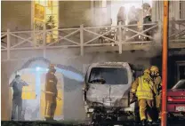  ?? PHOTO: JAMES ALLAN PHOTOGRAPH­Y ?? Burn out . . . Firefighte­rs put out a fire in a van in Queenstown early yesterday.