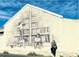  ?? Pictures: Alex Tilmans, IPAF ?? Left: Justin Nomad’s mural on Tennyson Street is titled “The Library“, and is in a spot where a mobile library used to park many years ago. It shows the contrastin­g ways of learning from the past to the present.