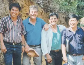  ??  ?? From left, Jerome Alto, site manager, John Felderhof, senior vice-president, Michael de Guzman, exploratio­n manager, and Cesar Puspos, senior geologist. Bre-X Minerals Ltd. geologist de Guzman was ruled by police to have committed suicide by jumping...