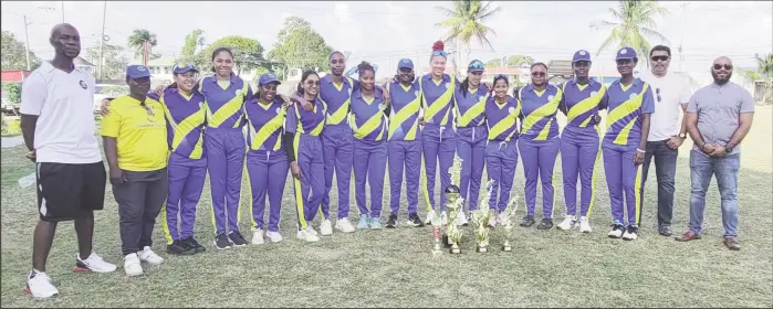  ?? ?? The victorious Demerara women’s team pose with their GCB Inter-County Women’s T20 trophy along with officials from the GCB