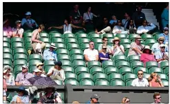  ??  ?? EMBARRASSI­NG: Many Wimbledon fans left to watch the World Cup