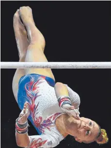  ?? FOTO: AFP ?? Alles eine Frage der Körperspan­nung: Turnerin Lorette Charpy während der European Championsh­ips.