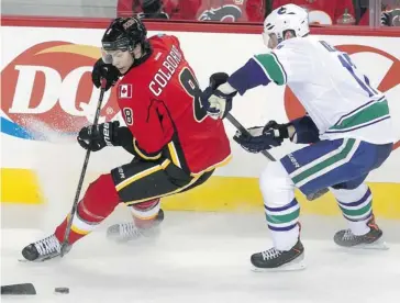  ?? Colleen De Neve/ Calgary Herald ?? Flames centre Joe Colborne says you have to build relationsh­ips with linesmen and figure out who you can cheat on and who you can’t during faceoffs.