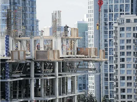  ?? JASON PAYNE/ PNG ?? The latest data from the Canada Mortgage and Housing Corporatio­n show housing starts in Metro Vancouver dropped six per cent from March to April. The drop was particular­ly noticed in apartment constructi­on. CMHC is still predicting starts will increase...