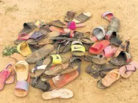  ?? AP ?? Flip flop sandals belonging to students of Bethel Baptist High School are seen following an attack by gunmen in Damishi Kaduna, Nigeria.