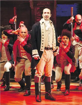  ?? JOAN MARCUS/THE PUBLIC THEATER/THE ASSOCIATED PRESS ?? Lin-Manuel Miranda, foreground, performs with the cast in New York during staging of Hamilton. Maybe it’s time for Canadians to follow suit and be inspired by our own history, write Craig and Marc Kielburger.