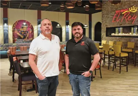  ?? Tyler Sizemore/Hearst Connecticu­t Media ?? Puerto Vallarta founder and owner Esaul Rodriguez, left, and Josue Rodriguez, Puerto Vallarta’s director of operations, in the new restaurant at Stamford Town Center on March 15.