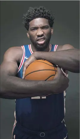  ?? Chris Szagola Associated Press ?? JOEL EMBIID guided the Philadelph­ia 76ers to a third-place finish last season and the conference semifinals, where they lost to the rival Boston Celtics.