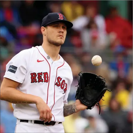  ?? STAFF PHOTO — NANCY LANE/BOSTON HERALD ?? Boston Red Sox starting pitcher Tanner Houck reacts during the fourth inning of a June 4 game against the Tampa Bay Rays at Fenway Park.