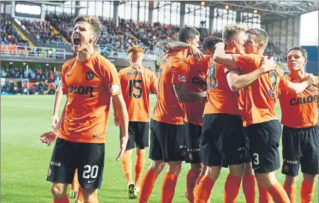  ??  ?? PRIDE AND PASSION: Blair Spittal leads United celebratio­ns after a Dundee derby goal