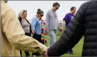  ?? (AP/Mark Humphrey) ?? Capital punishment protesters pray Thursday on the grounds of Riverbend Maximum Security Institutio­n in Nashville, Tenn.